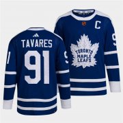 Wholesale Cheap Men's Toronto Maple Leafs Black #91 John Tavares Blue 2022 Reverse Retro Stitched Jersey