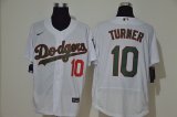 Wholesale Cheap Men's Los Angeles Dodgers #10 Justin Turner White With Green Name Stitched MLB Flex Base Nike Jersey