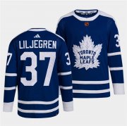Wholesale Cheap Men's Toronto Maple Leafs Black #37 Timothy Liljegren Blue 2022 Reverse Retro Stitched Jersey